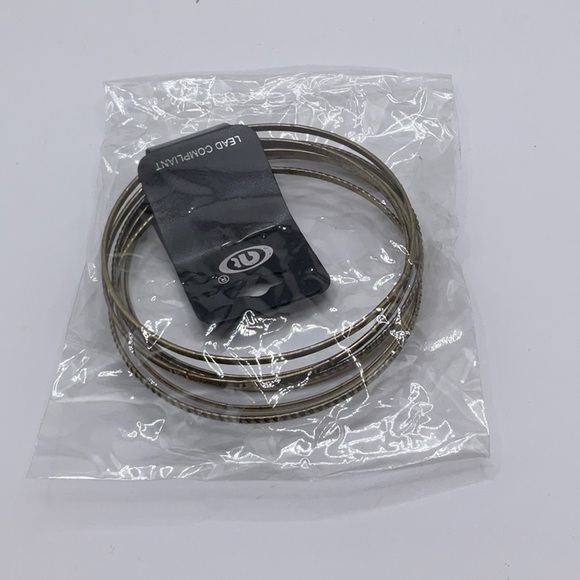 Woman’s contemporary fashion bangles - Picture 3 of 3